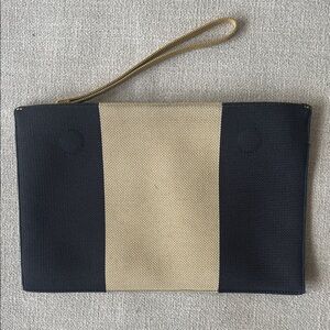 Rothy’s navy blue and tan wallet, wristlet, or clutch